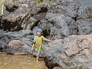 The boys were playing on the rocks and enjoy the Chok Kra-DinÂ WaterFalls